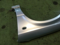 Guarda-lamas dianteiro esquerdo SUBARU LEGACY OEM 57120AE011 BH5 2001 Silver 01G