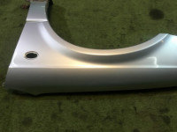 Guarda-lamas dianteiro esquerdo SUBARU LEGACY OEM 57120AE011 BH5 2001 Silver 01G