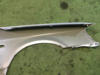Guarda-lamas dianteiro esquerdo SUBARU LEGACY OEM 57120AE011 BH5 2001 Silver 01G