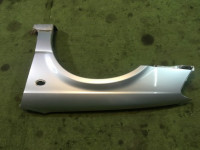 Guarda-lamas dianteiro esquerdo SUBARU LEGACY OEM 57120AE011 BH5 2001 Silver 01G