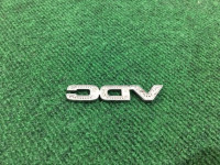 โลโก้ VDC SUBARU LANCASTER OEM 93073AE690 BHE 2000 white / grey 0U4