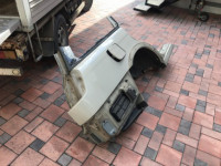 Guarda-lamas traseiro direito SUBARU LANCASTER OEM 51410AE160 BH9 1998 Beige 8L5
