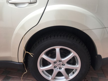 Ensanchador de aleta trasero izquierdo 91112AJ130G3 SUBARU OUTBACK