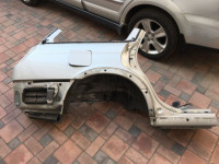 บังโคลนหลังขวา 51410AE160 SUBARU LANCASTER