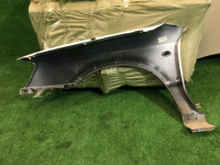 Guarda-lamas dianteiro direito SUBARU LANCASTER OEM 57120AE021 BHE BH9 2000 white / grey 0U4