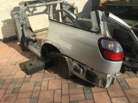 บังโคลนหลังซ้าย SUBARU LANCASTER OEM 51410AE170 BH9 BHE 2001 grey 1U2