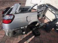 Guarda-lamas traseiro direito SUBARU LANCASTER OEM 51410AE160 BH9 BHE 2001 grey 1U2