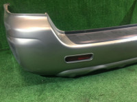 Para-choques traseiro SUBARU LANCASTER OEM 57703AE080MF, 57711AE040 BHE BH9 1999 white / grey 8K2