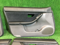 Door trim panels SUBARU LANCASTER OEM 94210AE100AC, 94210AE110AC, 94220AE100AC, 94220AE110AC BHE BH9 BH5 BE5 BE9 BEE 1999 white / grey 8K2