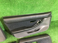 Door trim panels SUBARU LANCASTER OEM 94210AE100AC, 94210AE110AC, 94220AE100AC, 94220AE110AC BHE BH9 BH5 BE5 BE9 BEE 1999 white / grey 8K2