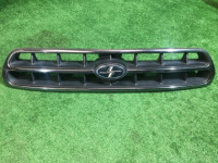 Rejilla del radiador SUBARU LANCASTER OEM 91121AE020 BHE BH9 1999 white / grey 8K2