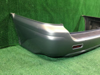 Бампер задний SUBARU LANCASTER OEM 57703AE080MF, 57711AE040 BHE BH9 1998 beige 8L5