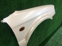 Guarda-lamas dianteiro direito SUBARU LANCASTER OEM 57120AE021 BHE BH9 2000 white 07C