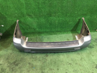 Parachoques trasero SUBARU LANCASTER OEM 57703AE080LG BHE BH9 2000 silver 9G9