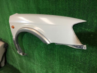 Guarda-lamas dianteiro direito SUBARU LANCASTER OEM 57120AE020 BHE BH9 1999 beige 8L5