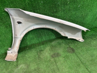 Guarda-lamas dianteiro esquerdo цвет 07C SUBARU LANCASTER OEM 57120AE031 BH9 2001 White 07C