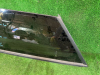 Left rear quarter glass SUBARU OUTBACK OEM 65210AG010 BPE 2004