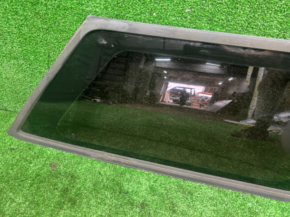 Cristal trasero derecho SUBARU LANCASTER OEM 65210AE000NB BH9 1998