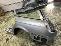 Guarda-lamas traseiro esquerdo SUBARU LEGACY OEM 51410AE150 BH9 2001 Silver 01G