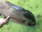 Pasarruedas delantero derecho SUBARU LANCASTER OEM 59110AE020 BHE 2000 beige 8L5