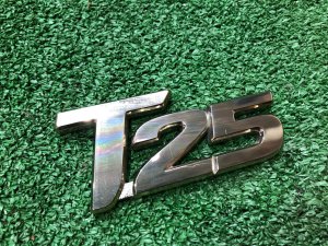 Emblem T25 SUBARU FORESTER OEM 93071FC040 SF9 1999 White 51E